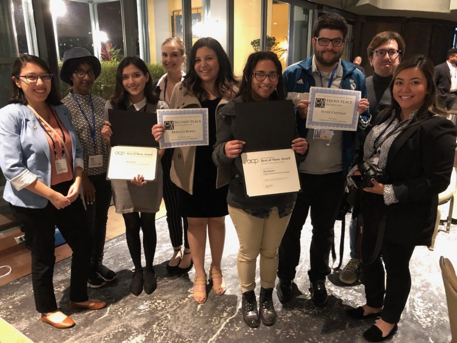 The Runner staff poses with awards after the California College Media Association banquet on March 2, 2019.