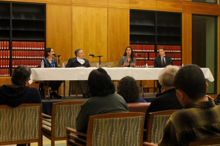 Panelists discuss local immigration issues to crowd on Feb. 13, 2019.