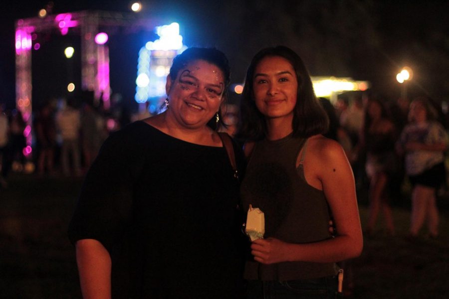 Mother and daughter, Maribel Montelongo-Torres, a master program student in the Education Leadership program and Isabella Torres, a freshman studying biology enjoy their night at the 5th annual Runners Night Carnival. 
