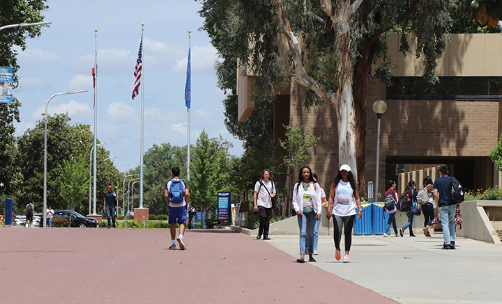 Students stroll along the red brick road at CSU Bakersfield to commence the start of Fall 2019 semester