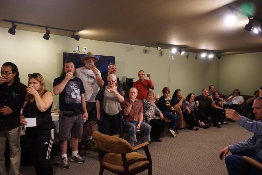Friends and family share a toast to Jason Rickett at McMurphy's Tavern, on Monday Sept. 9,2019.