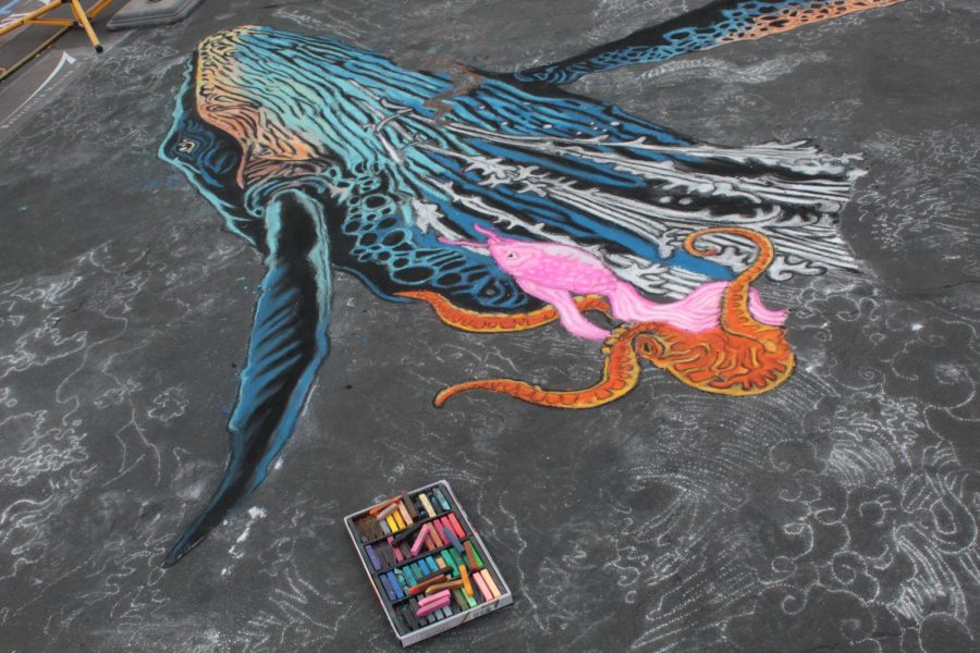 An untitled piece by Francisco Holguin, a CSUB alumni, works on Day 1 of Via Arté at the Market Place.