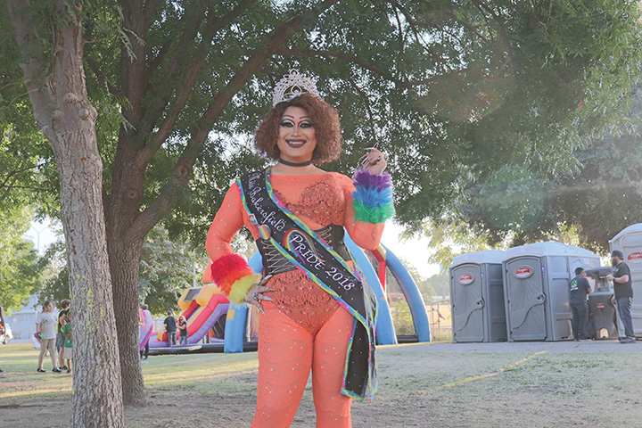 Phoebe D’ Momroe, dressed in drag at Stramler Park during a pride event on Oct. 12, 2019. 