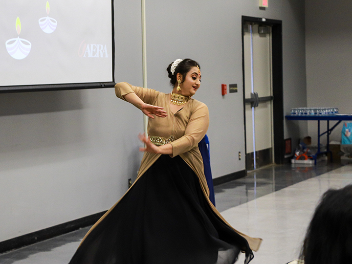 Mitali Sharma performs a Kathak dance and is also wearing a Salwar Kameez suit. Sharma performed during the Diwali Celebration on Oct. 29, 2019 inside the Student Union MPR.