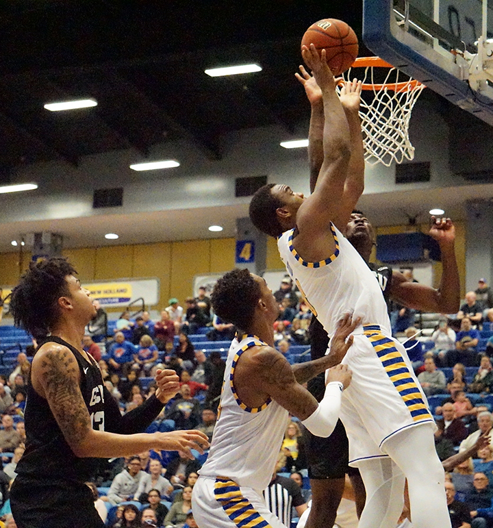 Junior Center Ronne Readus goes for two points with a layup against Grand Canyon during basketball game Sat. Jan. 4 at Icardo Center