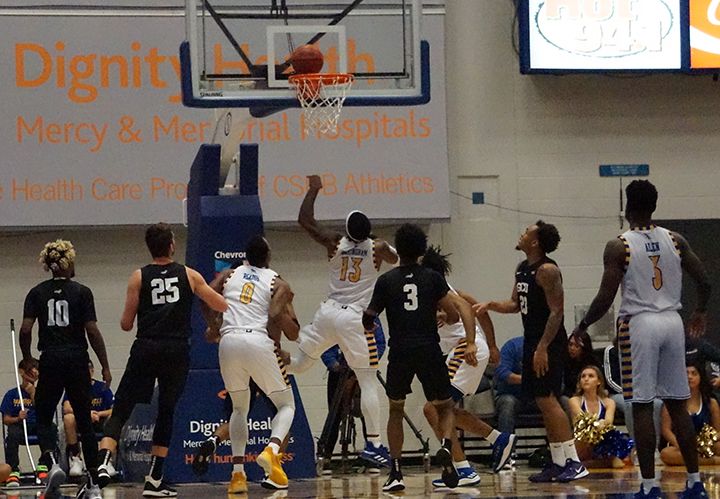 Junior Guard De'Monte Buckingham goes for a basket against Grand Canyon during basketball game Sat. Jan. 4 at Icardo Center