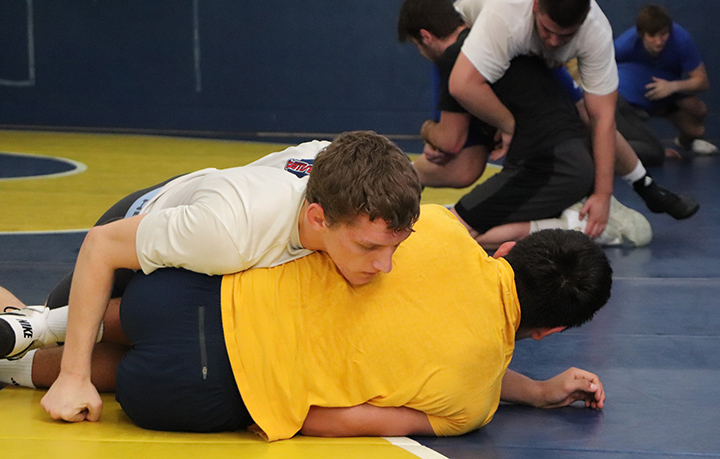 Senior Jacob Thalin practicing take downs during practice on Tuesday Jan 21st. 