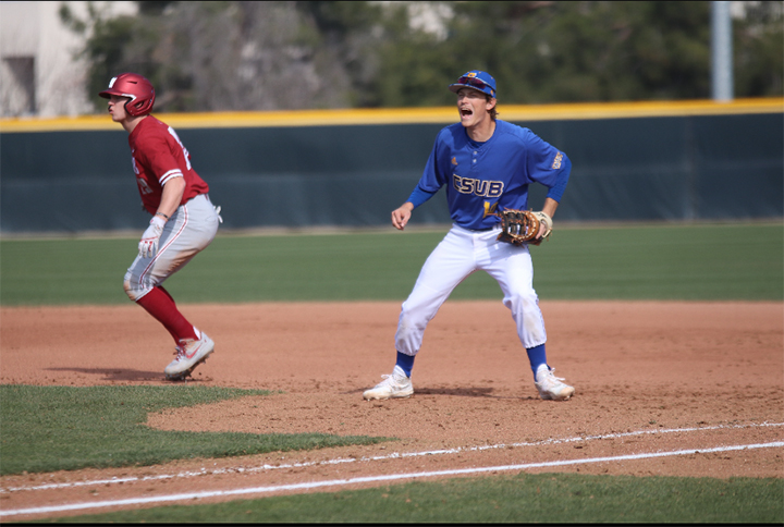 Senior 1st baseman Tyler Jorgensen yells and cheers his team on during the game against Washington State Series at Hardt Field. 