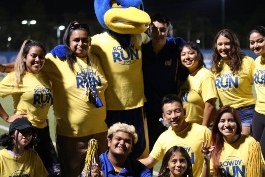 Some of our ASI members pose with our runner mascot after the Rowdy Runner Event for the Freshman Class of 2023 during the women’s soccer game that happened Friday September 6,2019.