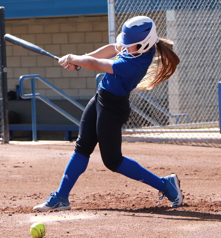 Senior shortstop Cydney Curran taking warm-up swings before practice on Feb 12.