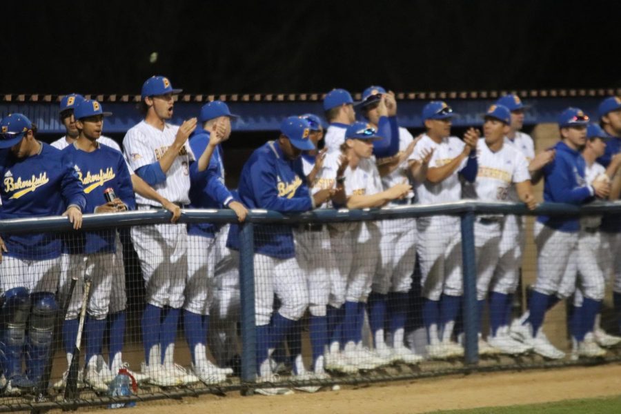 Baseball team celebrates a play during the opening night game against Washington State Cougars on Friday Feb. 14th