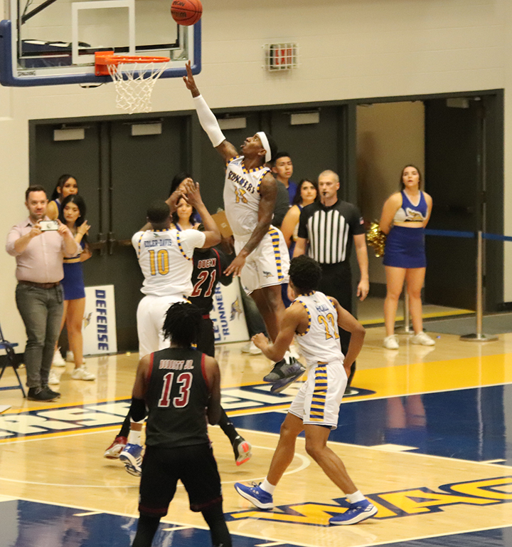 Redshirt junior guard De’Monte Buckingham going for a basket during the Homecoming Basketball game at the Icardo Center on Feb. 29