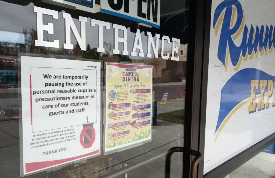 A sign on the door of Runner Express informs customers that the use refillable cups are temporarily banned from campus foodservice locations. This and other changes to foodservice procedures were implemented on Friday, March 6in response to the increased outbreak risk associated with COVID-19.
