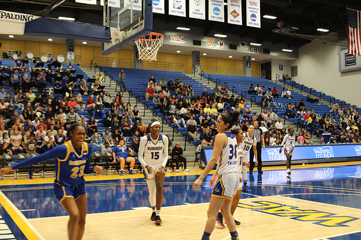 CSUB freshman I'Yanna Lops, sophomore Miracle Saxon, and redshirt-junior Kate Tokuhara all celebrating during the blue-and-gold game on  Oct. 22, 2019