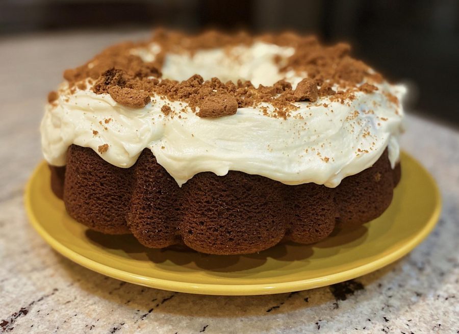 Top the cake with crumbled cookies to perfect this fall treat!