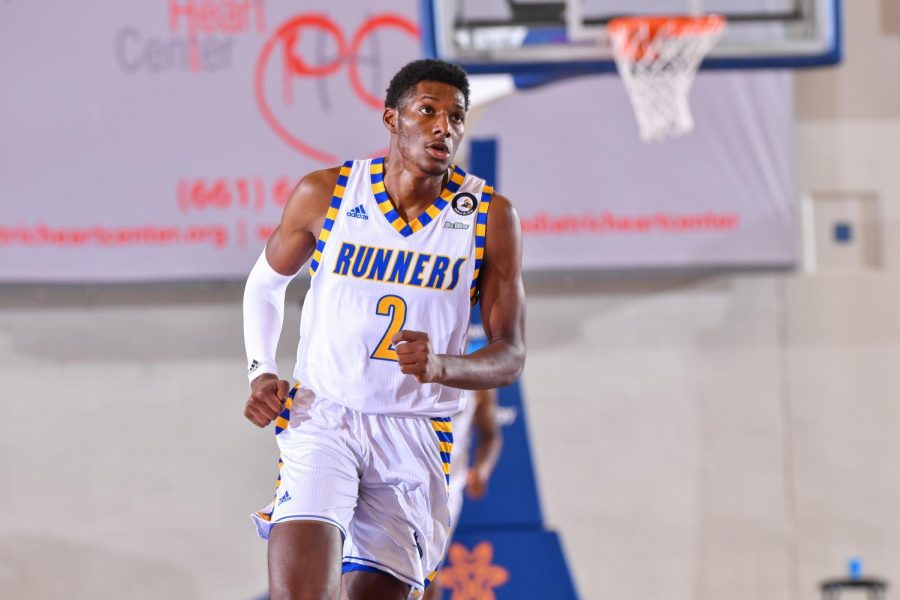 David Dennis / CSUB Athletics

CSUB junior Travis Henson runs up the floor in Monday's season-opening 94-43 victory over Bethesda at the Icardo Center. Henson made seven 3-pointers and finished with a team-high 21 points for the Roadrunners.