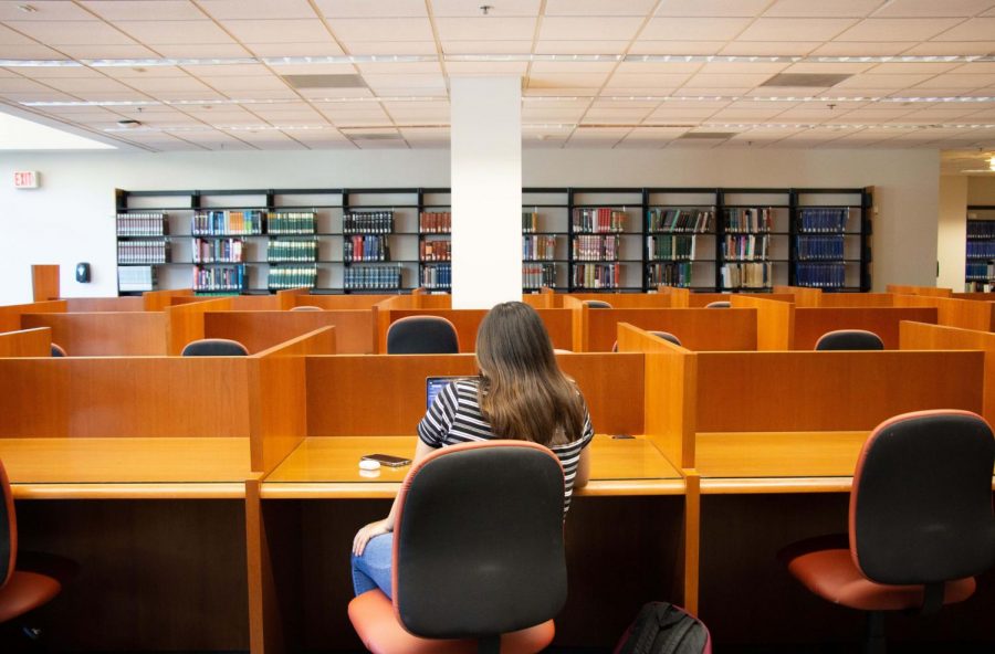 California State UniversityBakersfieldstudent attends class from a study cubicle in the first level of the library. Wednesday, September,1, 2021.