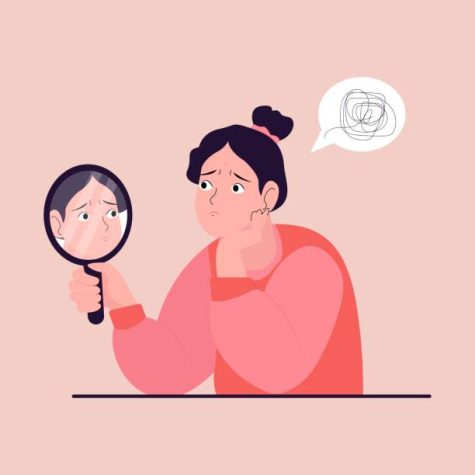 A girl with Body Dysmorphic Disorder looking at herself in mirror