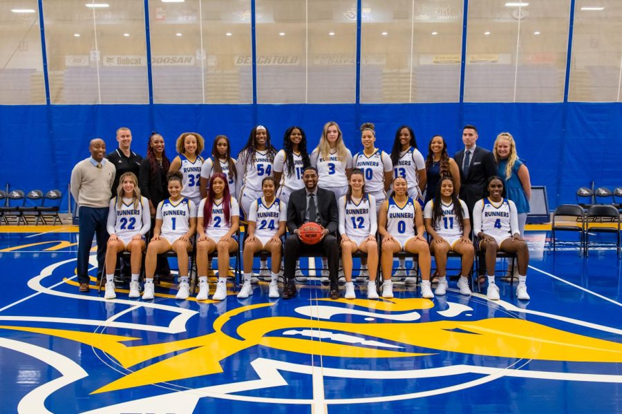 Cal State Bakersfield Women's Basketball team poses for a group picture. 