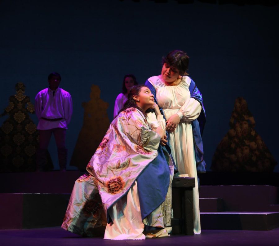 Shakespeare Unmasked: Gissela Zelaya, left, playing the role of Desdemona, Vanessa Beltran, right, Playing the role of Emilia. Zelaya is holding tight to the arm of Vanessa Beltran.