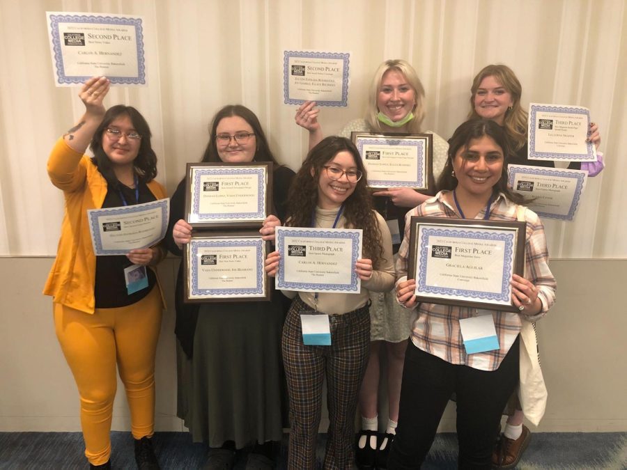 photo by Jennifer BurgerThe Runner staff showing off their 10 awards won at the California College Media Association contest