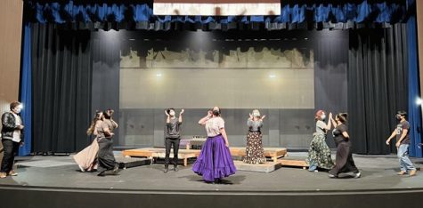 Cast rehearsing for the play
