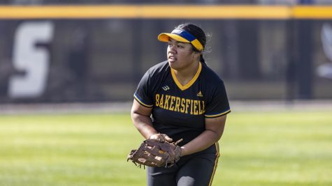 Shaylene Fuimaono with her softball glove on, on the field.