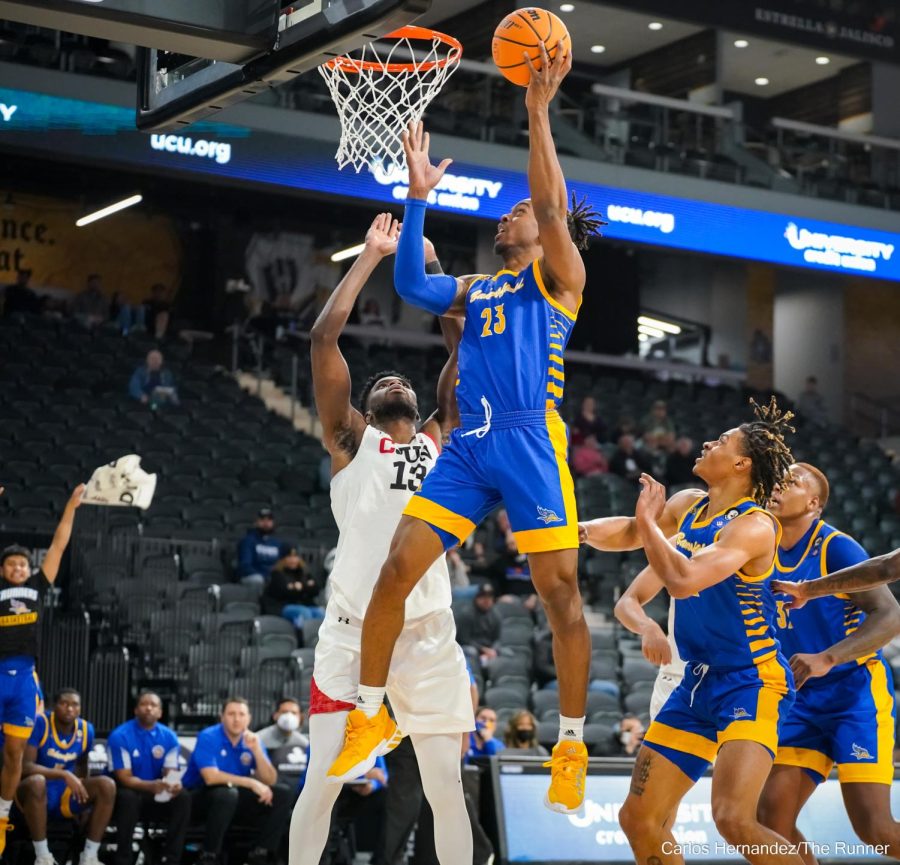 Ivan Reynolds exploits a hole in CSUN's baseline defense for an easy layup.
