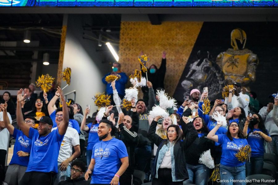A cohort of CSUB students, staff, and faculty celebrate the 'Runners victory in game one of the Big West Championships.
