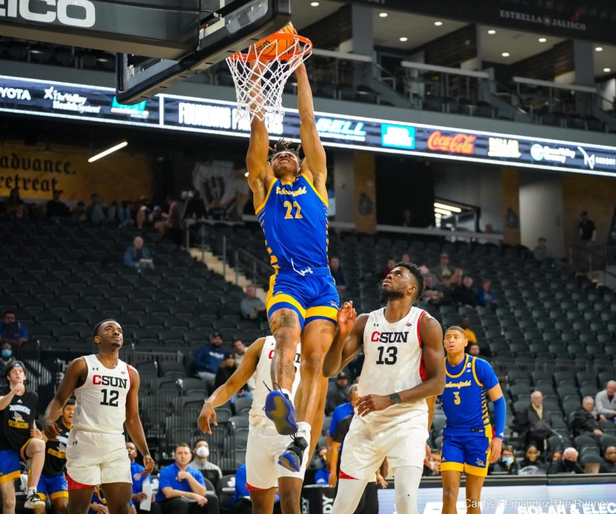 Justin McCall beats Marcel Stevens off the dribble for an uncontested dunk in the second half of Wednesday's game. McCall finished the night with 11 points, 3 rebounds, 2 assists, 1 steal, and 1 block.

