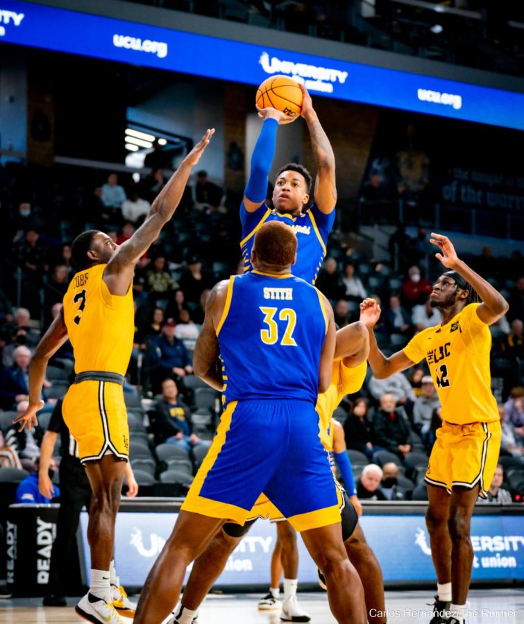 CSUB's Justin Edler-Davis finds an opening in LBSU's stifling defense.
