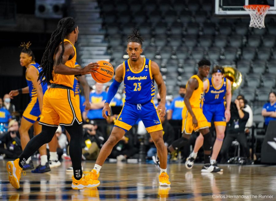 CSUB's Ivan Reynolds guards LBSU's second-leading scorer Colin Slater. Slater was held to 5 points in the game.

