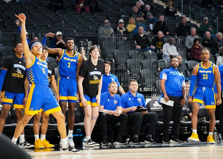 The 'Runners anxiously cheer on as they attempt a comeback in the final minutes of the game.
