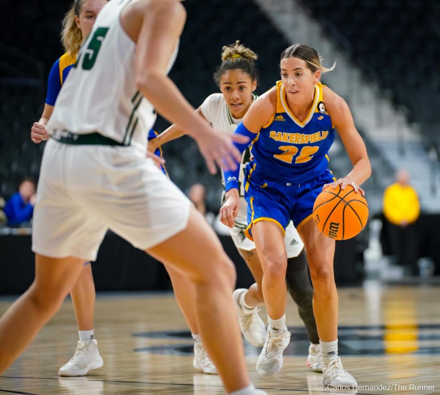CSUB's Andie Easley drives against number 1 tournament seeded Hawaii.

