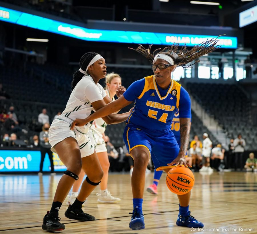 Vanessa Austin posts up the defender in the final minutes of the game.
