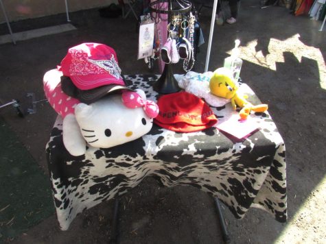 A $5 items table starring a Hello Kitty plush.