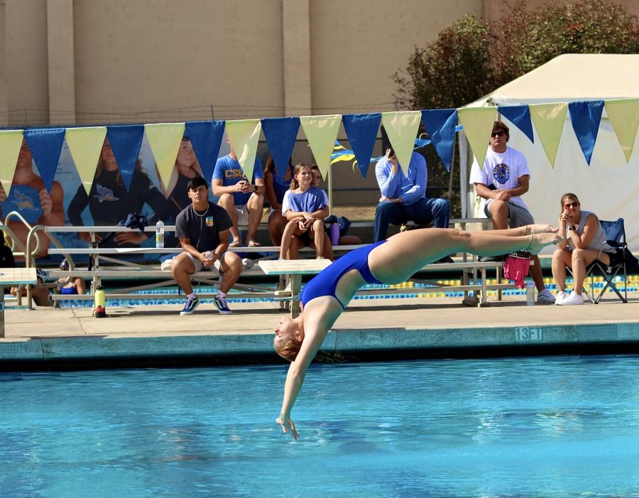 Chloe Brown took first in the 3 meter diving board with a score of 249.61 over Pomona-Pitzer on Saturday, Oct. 22, 2022 at the Hillman Aquatic Center. 