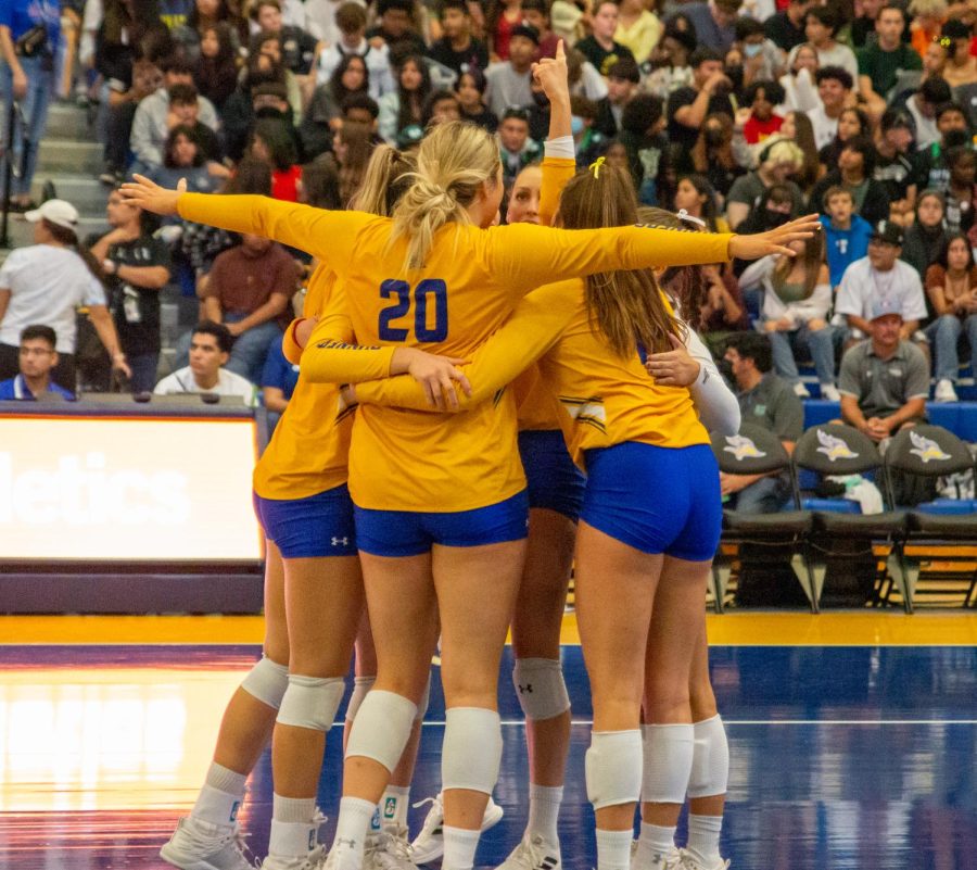 CSUB Roadrunner Lizzie Binder (20) cheering with her teammates after scoring against the University of the Pacific Tigers in the Icardo Center on Friday Sept. 16, 2022. Photo by Elise Mayer.