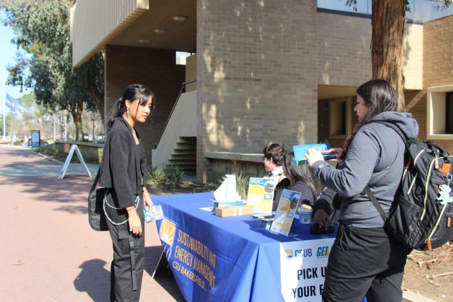 Arlene Salvador a Pre-Nursing junior is signing up for the free bus pass, saying "You never know when you might need to take the bus."