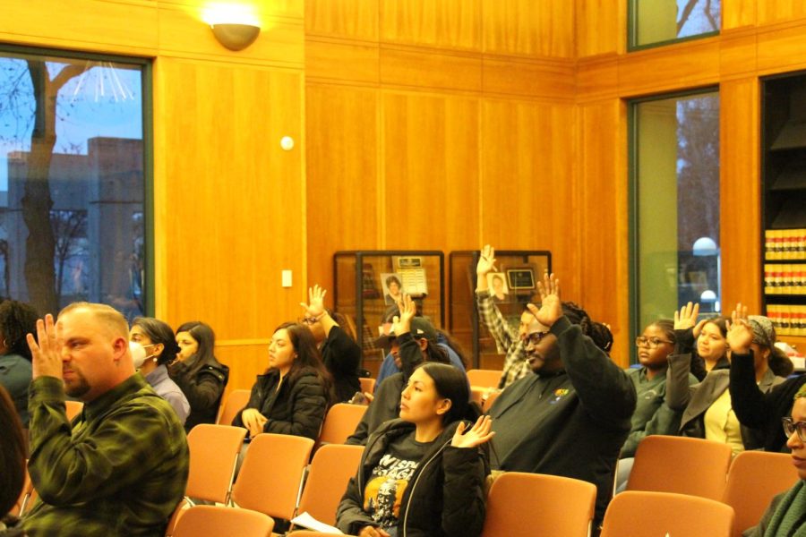 Audience members who have been impacted by the prison system in some form raise their hands. Photo by Gillian Galicia / The Runner.