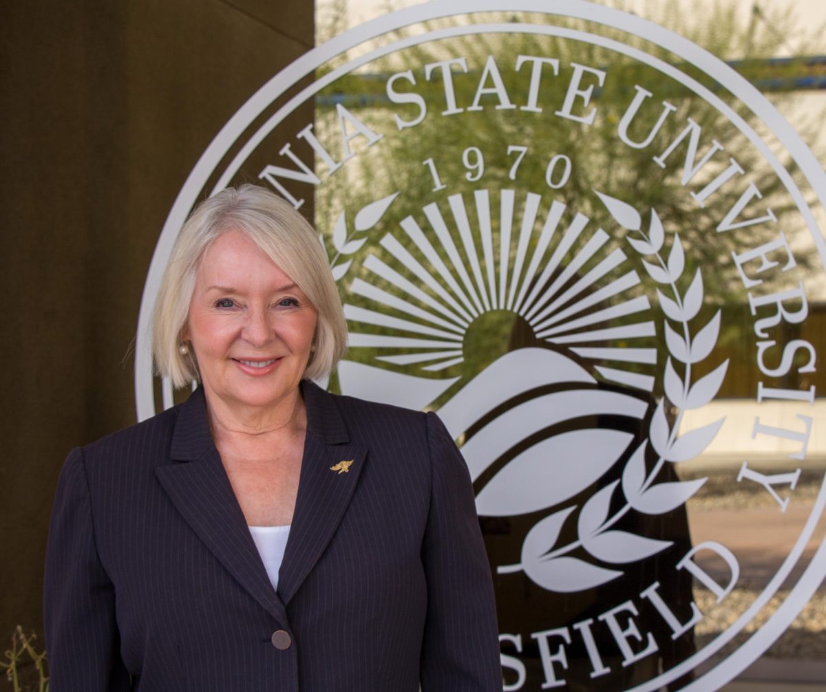 Photo by Jocelyn Landon of President Zelezny outside her office.