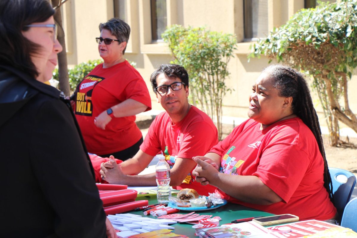 Members of the Bakersfield chapter of the California Faculty Association hosted an action rally on Oct. 4, 2023, to spread the word about a potential strike. Photo by Blake Burton / The Runner