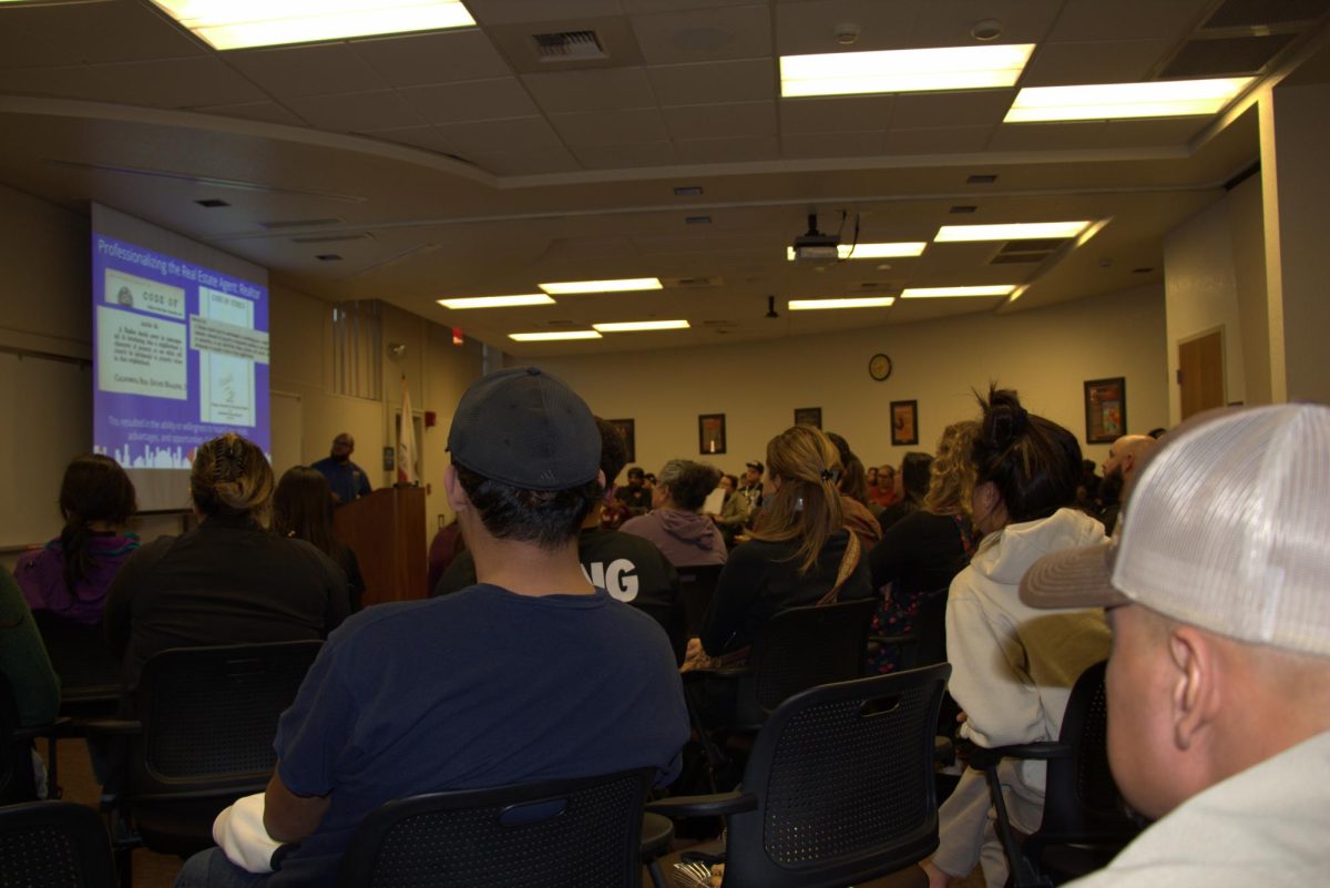 Community members in Kern County attend the red lining presentation on April 8, at Bakersfield College. Photo by Jocelynn Landon / The Runner