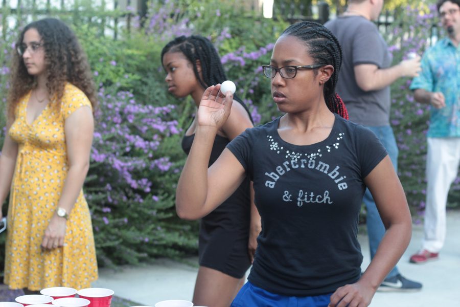 Kristyn Logan, a Junior Biochemistry plays an intense game of table pong during the Runner Luau.